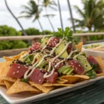 Poke nachos served on a rustic wooden platter